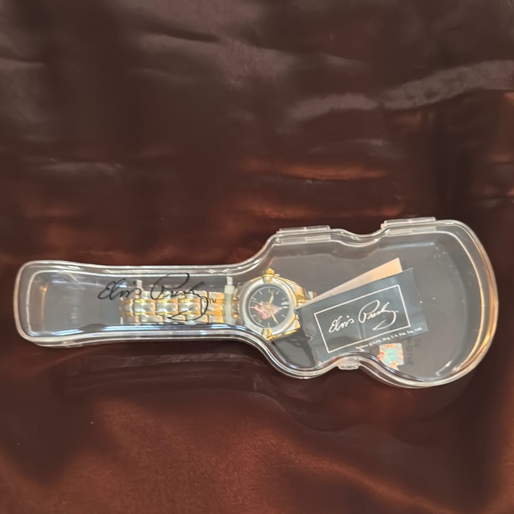 Vintage Limited Edition Gold and Silver Elvis Presley Watch with Guitar Case.